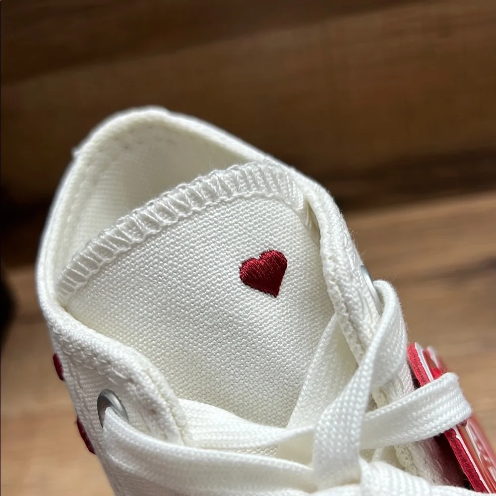 Converse White High-Tops with Red Heart Details